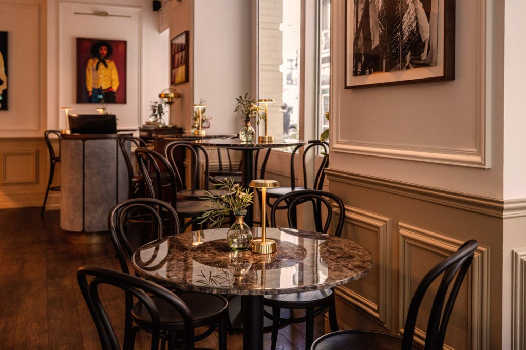 Interior of Ziggy Green café with mirrored coffered ceiling and wall panelling, designed using architectural mouldings from The Library Ladder Company